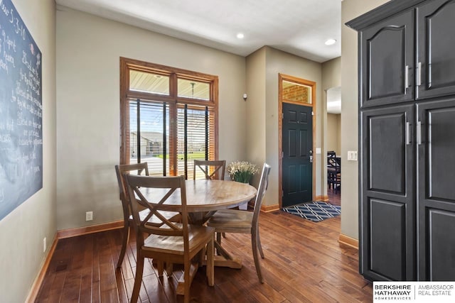 dining room with baseboards, recessed lighting, and dark wood finished floors