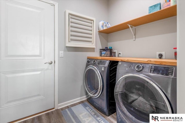 708 Sunset Blvd, Palmyra, NE 68418 - laundry area with separate washer and dryer, wood finished floors, and baseboards