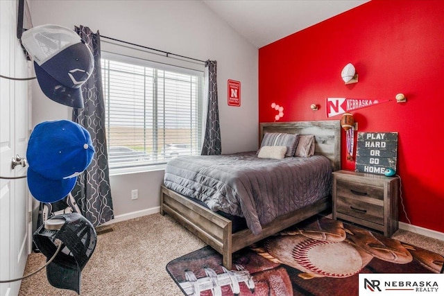 708 Sunset Blvd, Palmyra, NE 68418 - carpeted bedroom with lofted ceiling and baseboards