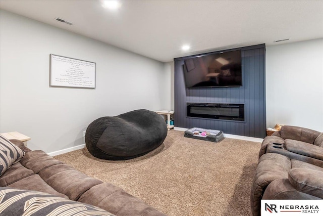 708 Sunset Blvd, Palmyra, NE 68418 - living room with carpet floors, baseboards, a large fireplace, and recessed lighting