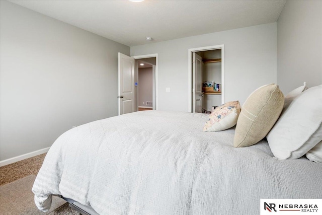708 Sunset Blvd, Palmyra, NE 68418 - carpeted bedroom featuring baseboards