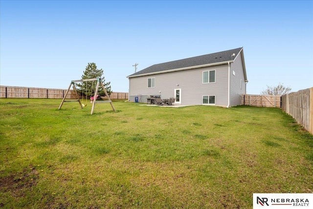 708 Sunset Blvd, Palmyra, NE 68418 - back of property with a playground and a patio