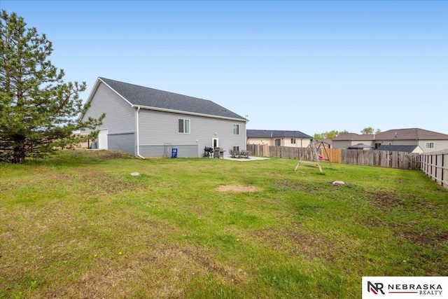 708 Sunset Blvd, Palmyra, NE 68418 - rear view of property with a patio area