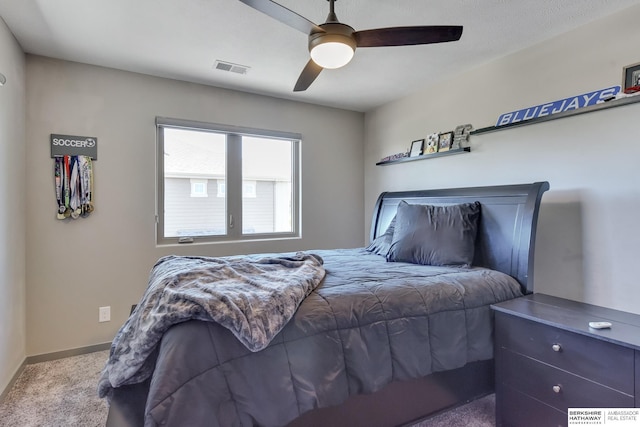 bedroom with visible vents, a ceiling fan, carpet, and baseboards