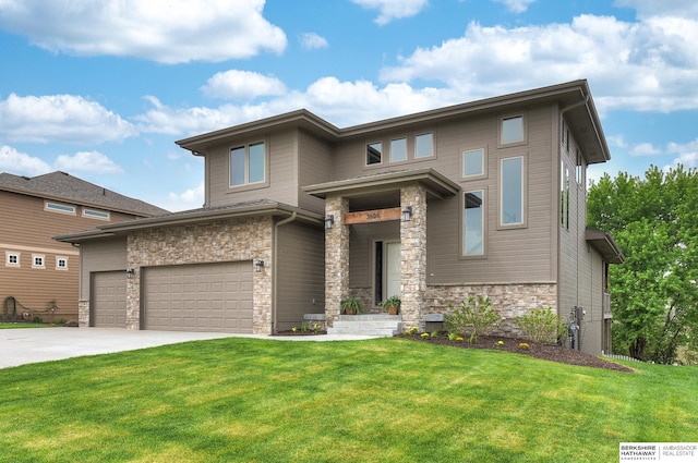 prairie-style home with a front yard, driveway, and stone siding
