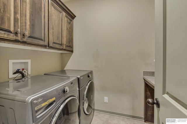 laundry room with cabinet space, independent washer and dryer, baseboards, and visible vents