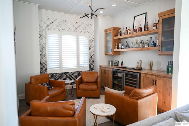 bar with wet bar, recessed lighting, and wine cooler