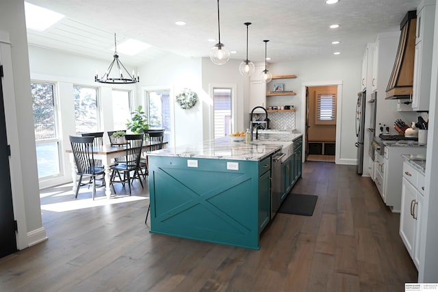 kitchen featuring open shelves, a sink, premium range hood, dark wood-style floors, and recessed lighting