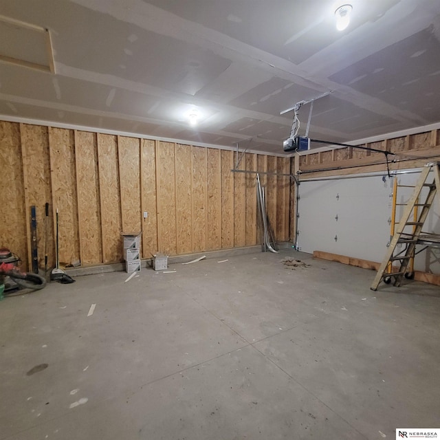 129 E 5th St, Valparaiso, NE 68065 - garage featuring a garage door opener