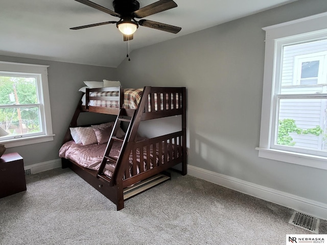 6512 Maple St, Omaha, NE 68104 - bedroom with vaulted ceiling, carpet floors, baseboards, and a ceiling fan