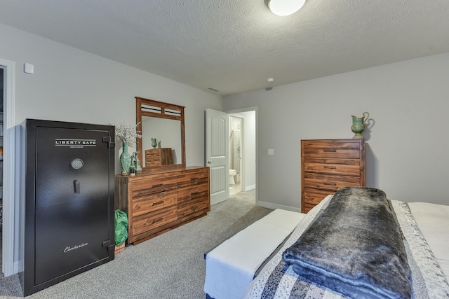 carpeted bedroom featuring baseboards