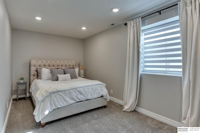bedroom featuring baseboards, recessed lighting, carpet, and visible vents
