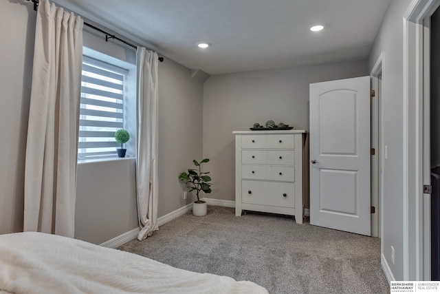 bedroom with carpet floors, recessed lighting, and baseboards