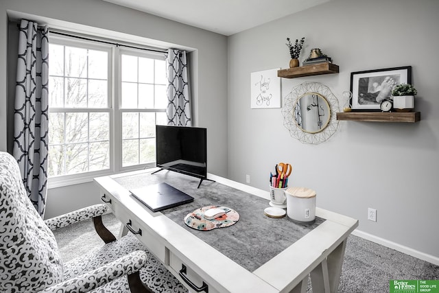 home office featuring carpet flooring, baseboards, and plenty of natural light