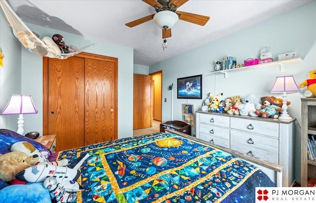 bedroom with a closet and ceiling fan