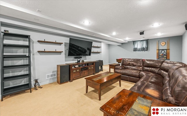 carpeted living area featuring a textured ceiling, visible vents, recessed lighting, and baseboards