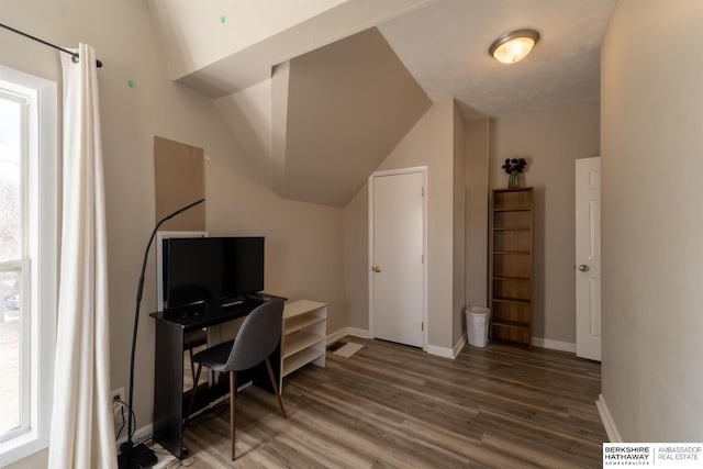 office area with wood finished floors and baseboards