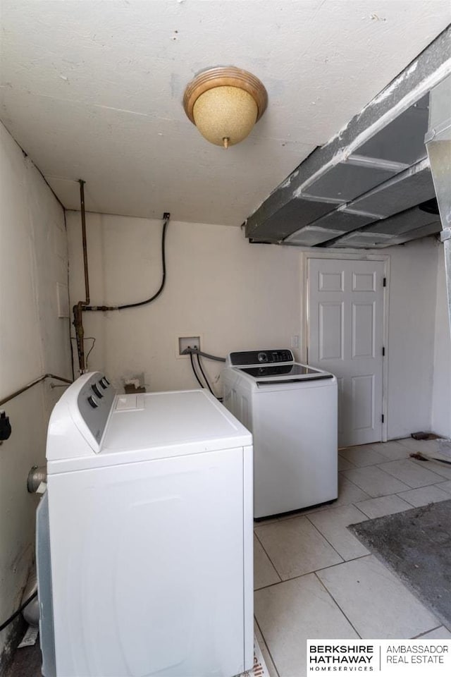 laundry area with laundry area and washing machine and dryer