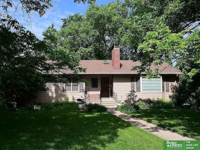 600 Ridgewood Ave, Omaha, NE 68114 - ranch-style house with a front yard, a shingled roof, and a chimney