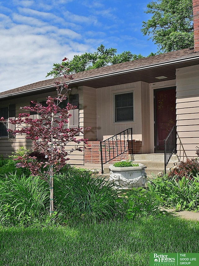 600 Ridgewood Ave, Omaha, NE 68114 - doorway to property with a shingled roof