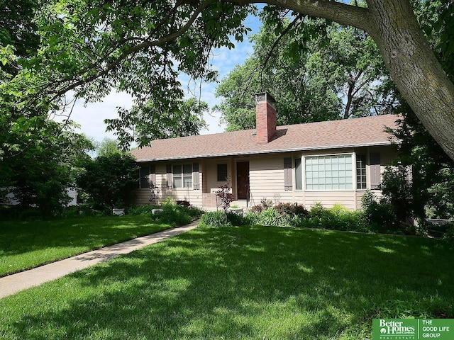600 Ridgewood Ave, Omaha, NE 68114 - ranch-style home with a front lawn and a chimney