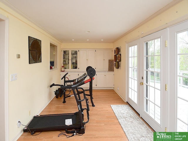 600 Ridgewood Ave, Omaha, NE 68114 - exercise room featuring light wood finished floors, french doors, and crown molding