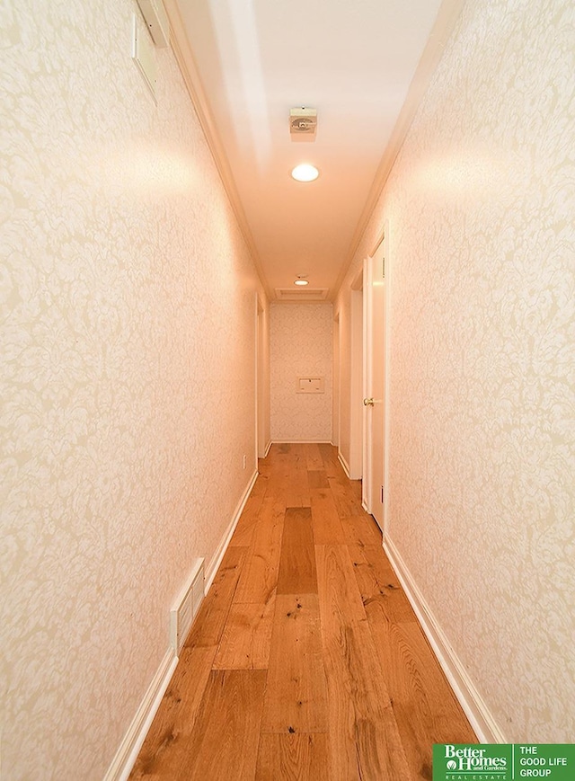 600 Ridgewood Ave, Omaha, NE 68114 - corridor featuring visible vents, recessed lighting, crown molding, and light wood-style floors