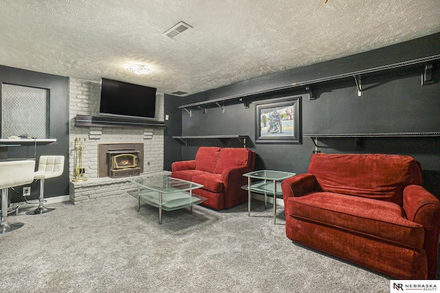 living area featuring a fireplace, a textured ceiling, visible vents, and carpet flooring