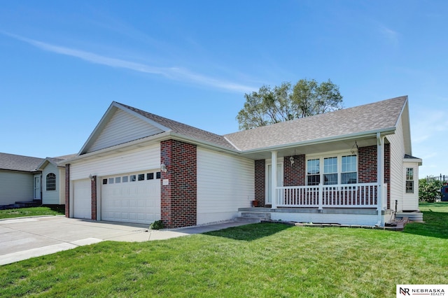 1521 Morton St, Lincoln, NE 68521 - ranch-style home with an attached garage, covered porch, brick siding, and driveway