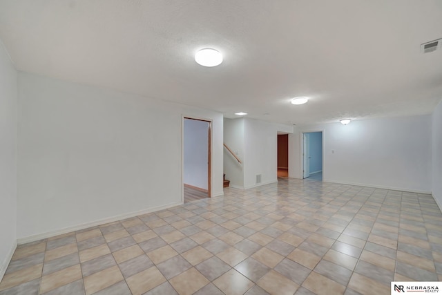 1521 Morton St, Lincoln, NE 68521 - spare room with baseboards and stairs