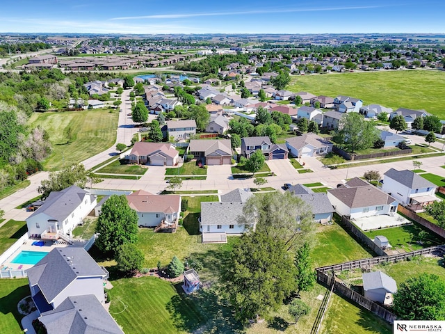 1521 Morton St, Lincoln, NE 68521 - aerial view of property and surrounding area featuring nearby suburban area and a pool area