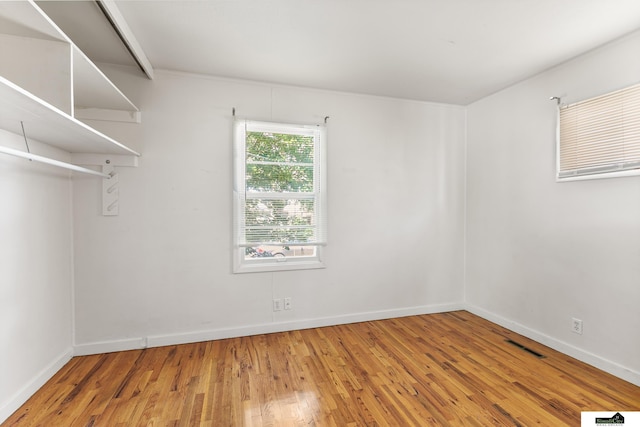1500 Burnham St, Lincoln, NE 68502 - unfurnished room featuring wood finished floors and baseboards
