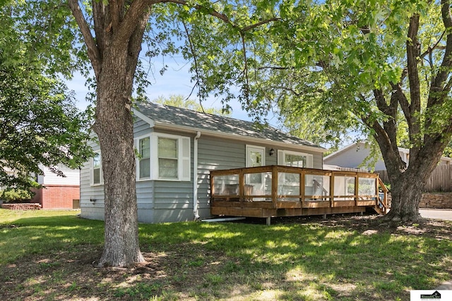 1500 Burnham St, Lincoln, NE 68502 - back of house featuring a deck and a shingled roof