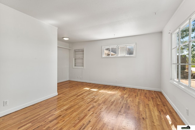 1500 Burnham St, Lincoln, NE 68502 - spare room with light wood finished floors and baseboards