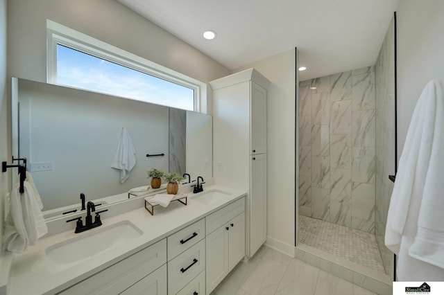 full bath with recessed lighting, a walk in shower, a sink, and marble finish floor