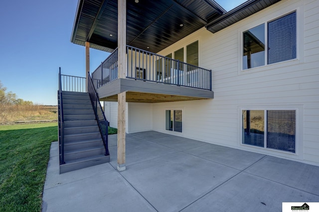 view of patio / terrace featuring stairway