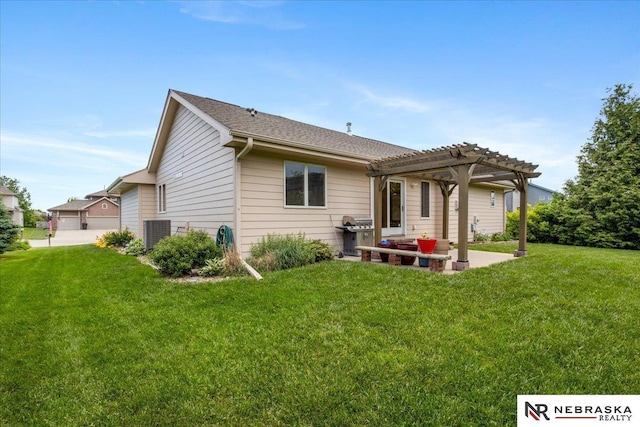back of house with a pergola, a patio area, a lawn, and central air condition unit