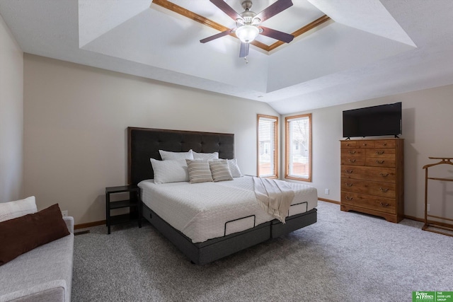 carpeted bedroom with lofted ceiling, ceiling fan, and baseboards