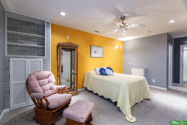 carpeted bedroom featuring recessed lighting, visible vents, ceiling fan, and baseboards