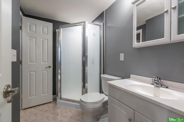 full bathroom with toilet, a shower stall, and vanity