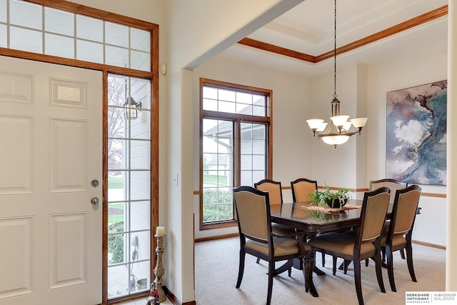 5210 S 165th St, Omaha, NE 68135 - dining room with an inviting chandelier, light colored carpet, and baseboards