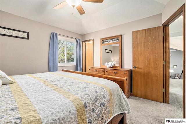 carpeted bedroom featuring a ceiling fan