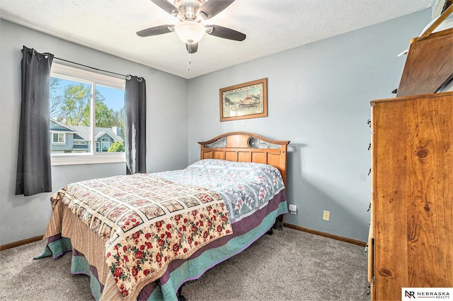 bedroom featuring carpet flooring, baseboards, and ceiling fan