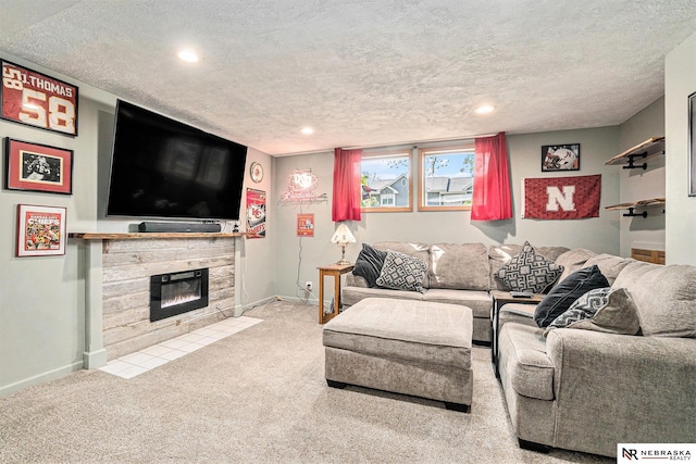 carpeted living room with baseboards, a fireplace, recessed lighting, and a textured ceiling