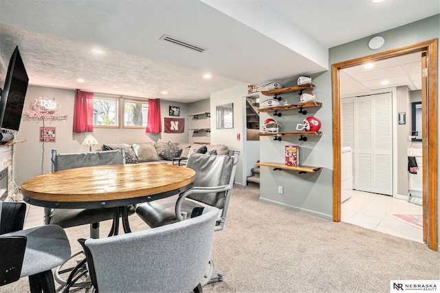 dining room featuring carpet floors, washer / clothes dryer, recessed lighting, stairs, and visible vents