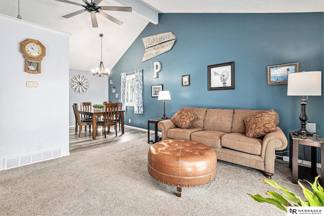 carpeted living area with visible vents, beamed ceiling, baseboards, high vaulted ceiling, and ceiling fan with notable chandelier