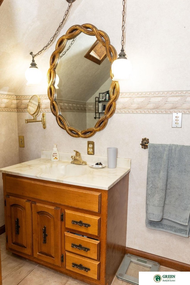 650 E 9th St, York, NE 68467 - bathroom featuring tile patterned flooring and vanity