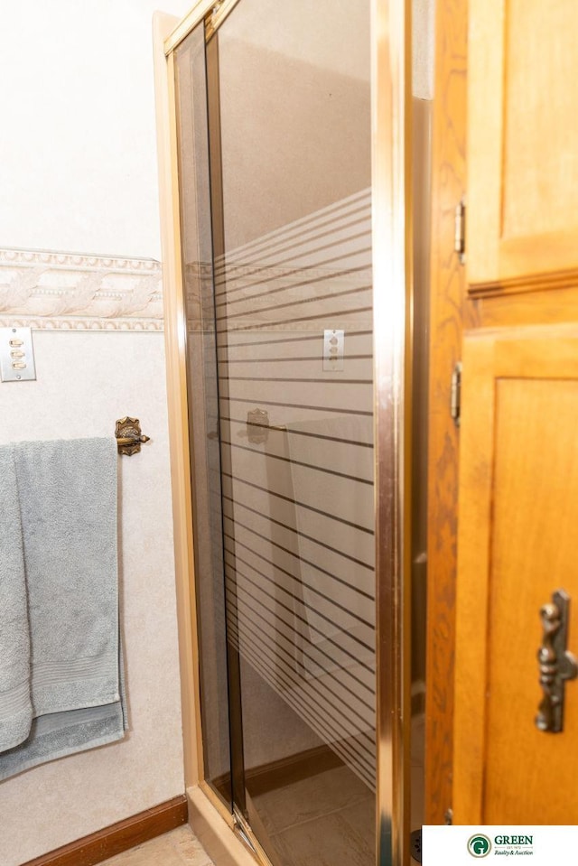 650 E 9th St, York, NE 68467 - full bathroom with a stall shower