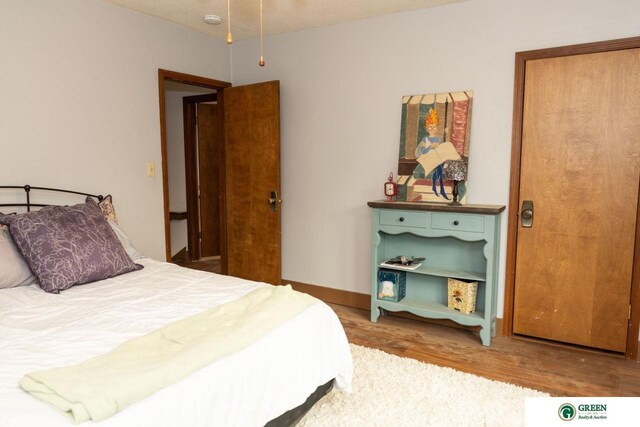 650 E 9th St, York, NE 68467 - bedroom with wood finished floors