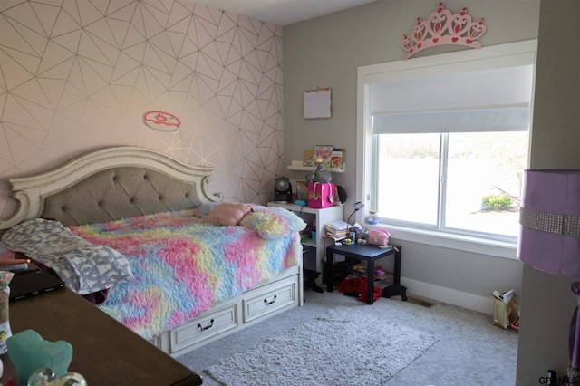 bedroom with carpet flooring, visible vents, and baseboards